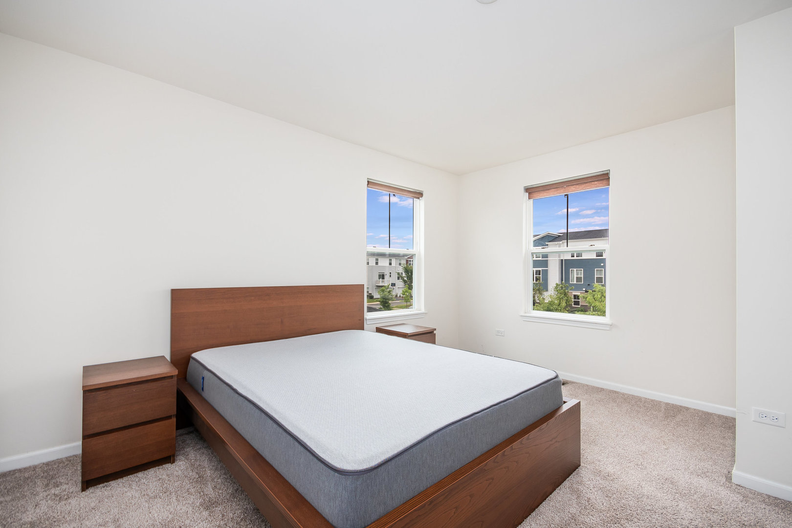 4166 Calder Lane Aurora, IL 60504 - Photo 17 of 30 a bedroom with a bed and window