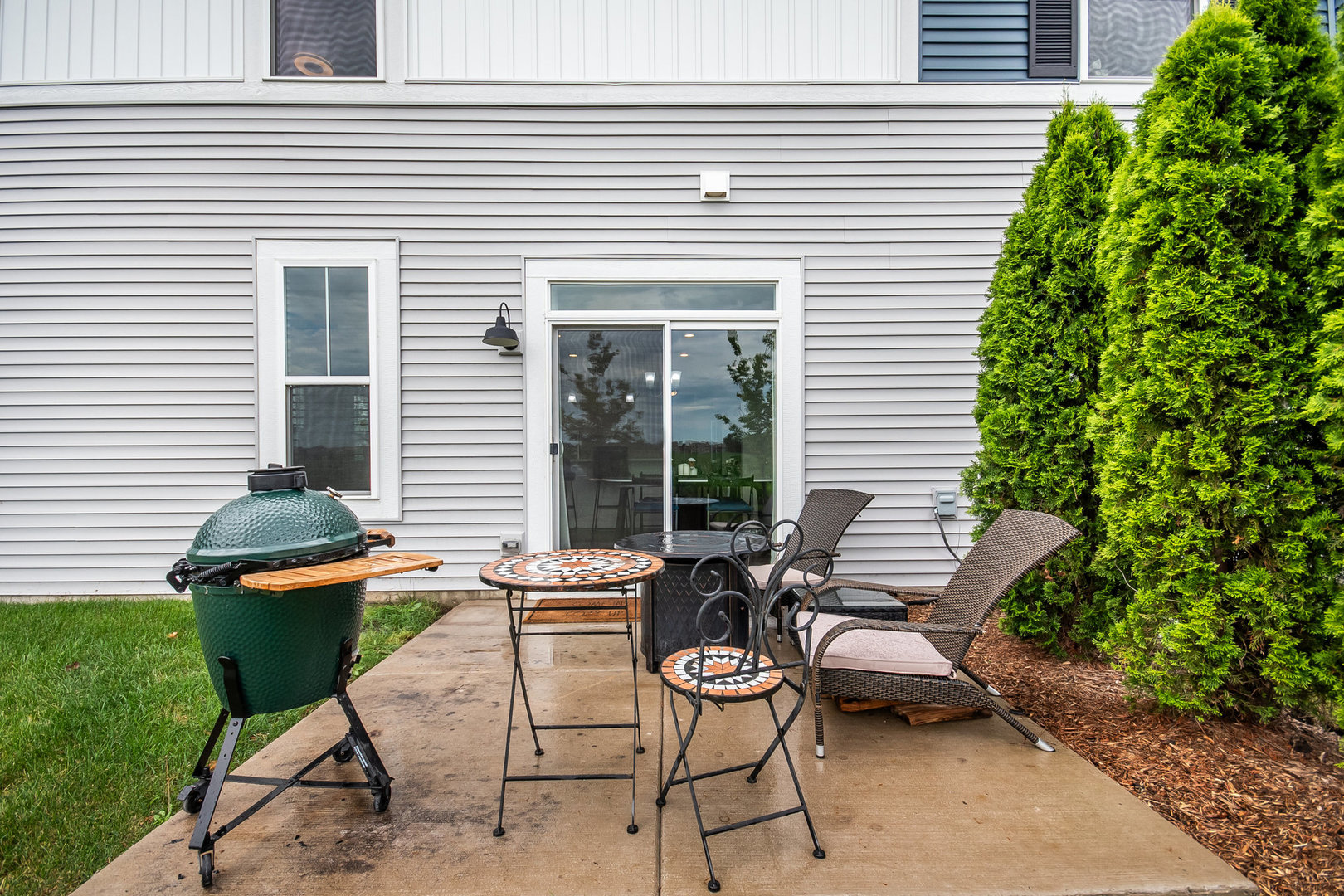 4166 Calder Lane Aurora, IL 60504 - Photo 21 of 30 a view of a house with backyard sitting area and garden