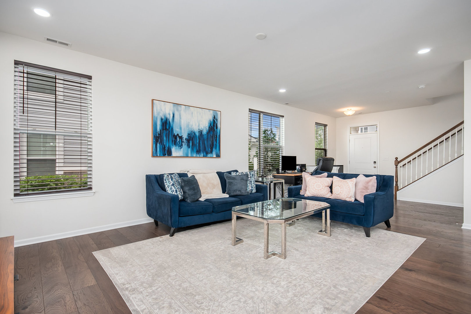 4166 Calder Lane Aurora, IL 60504 - Photo 3 of 30 a living room with furniture and a potted plant