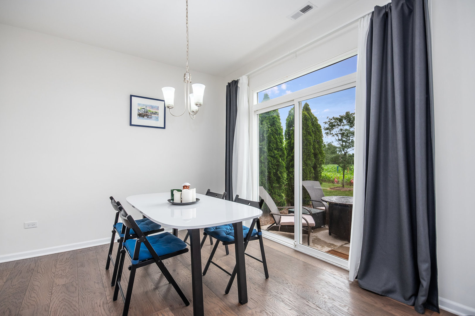 4166 Calder Lane Aurora, IL 60504 - Photo 5 of 30 a dining room with furniture window and wooden floor