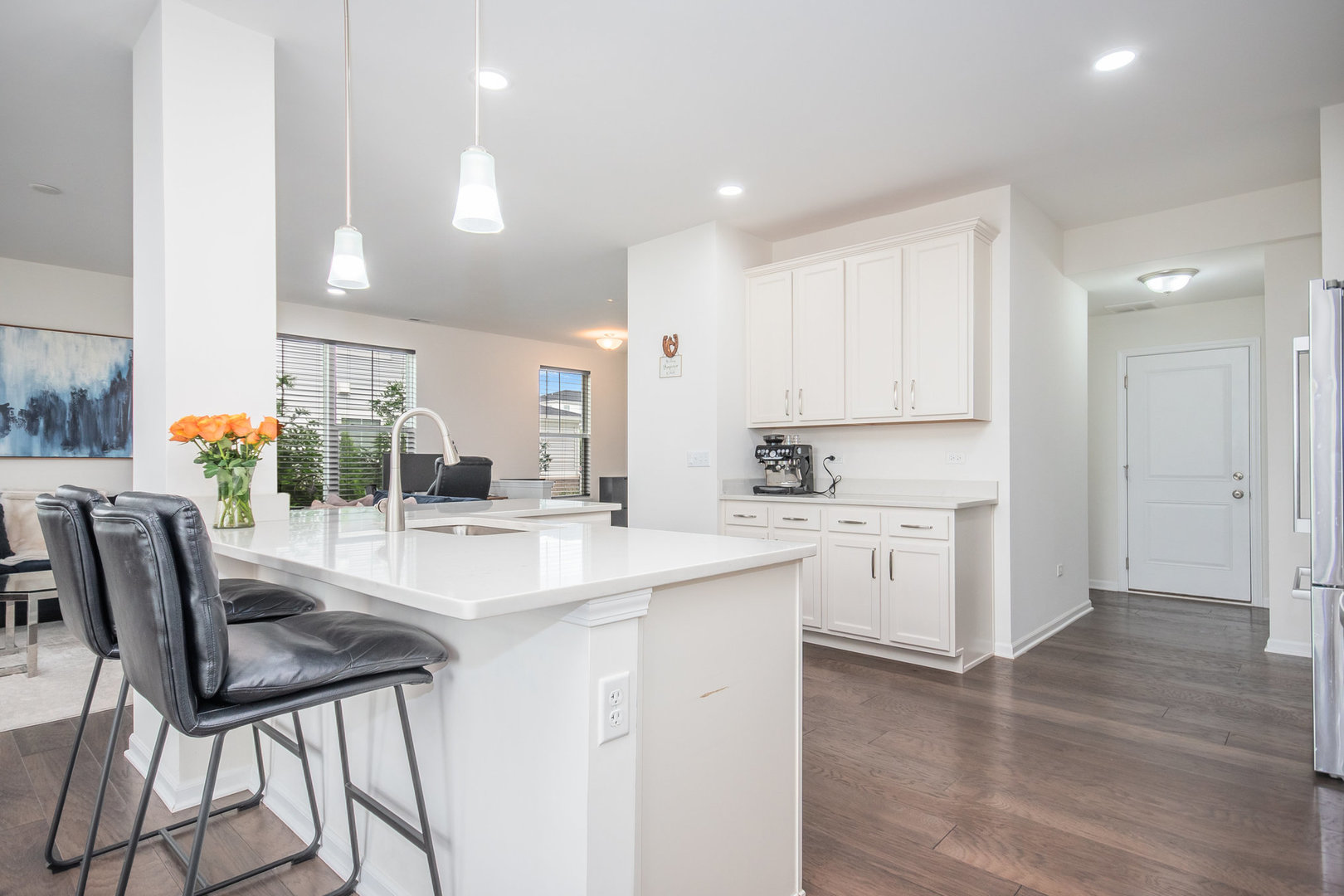 4166 Calder Lane Aurora, IL 60504 - Photo 6 of 30 a kitchen with white cabinets and sink