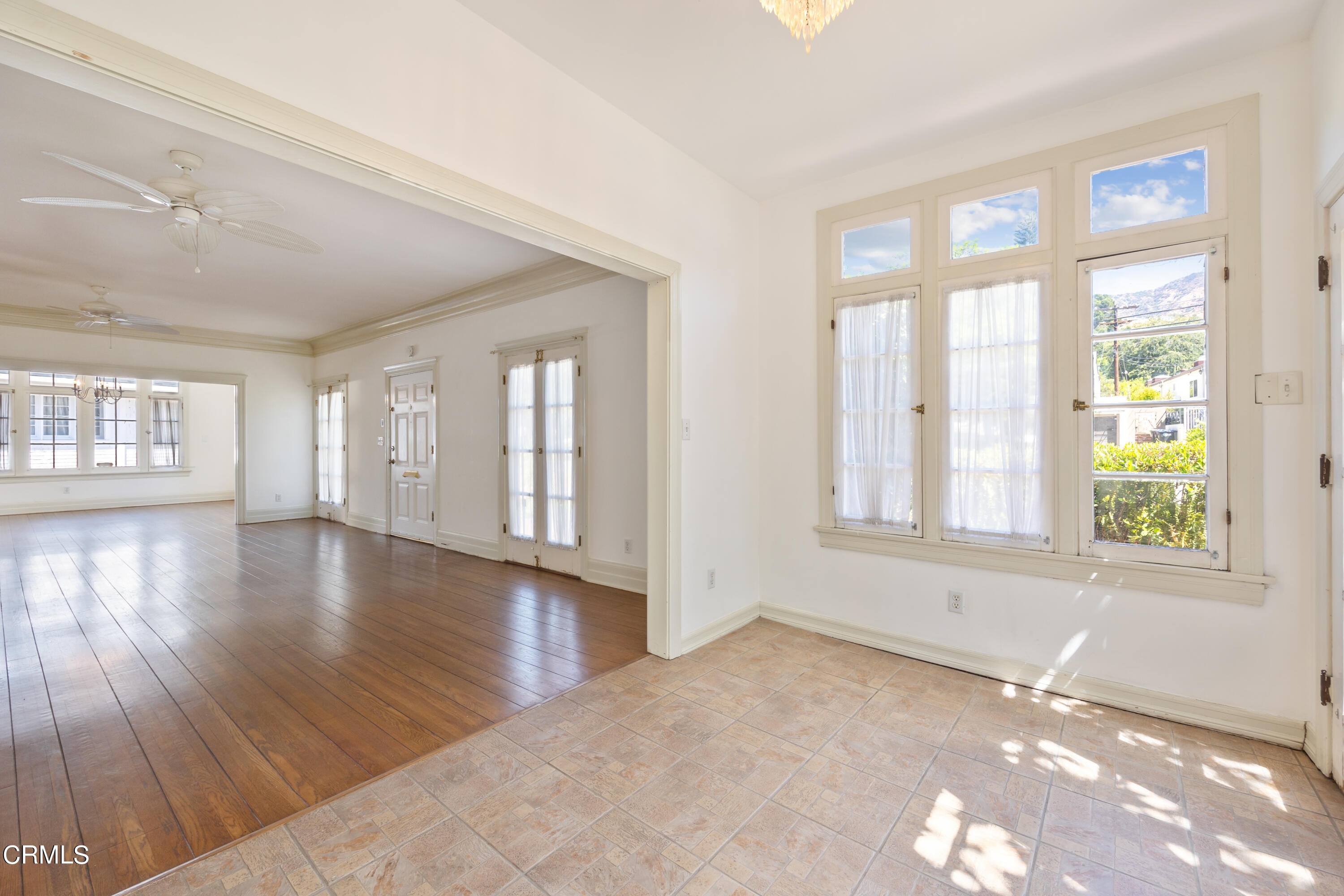 430 West Kenneth Road Glendale, CA 91202 - Photo 14 of 73 a view of an empty room with wooden floor and a window