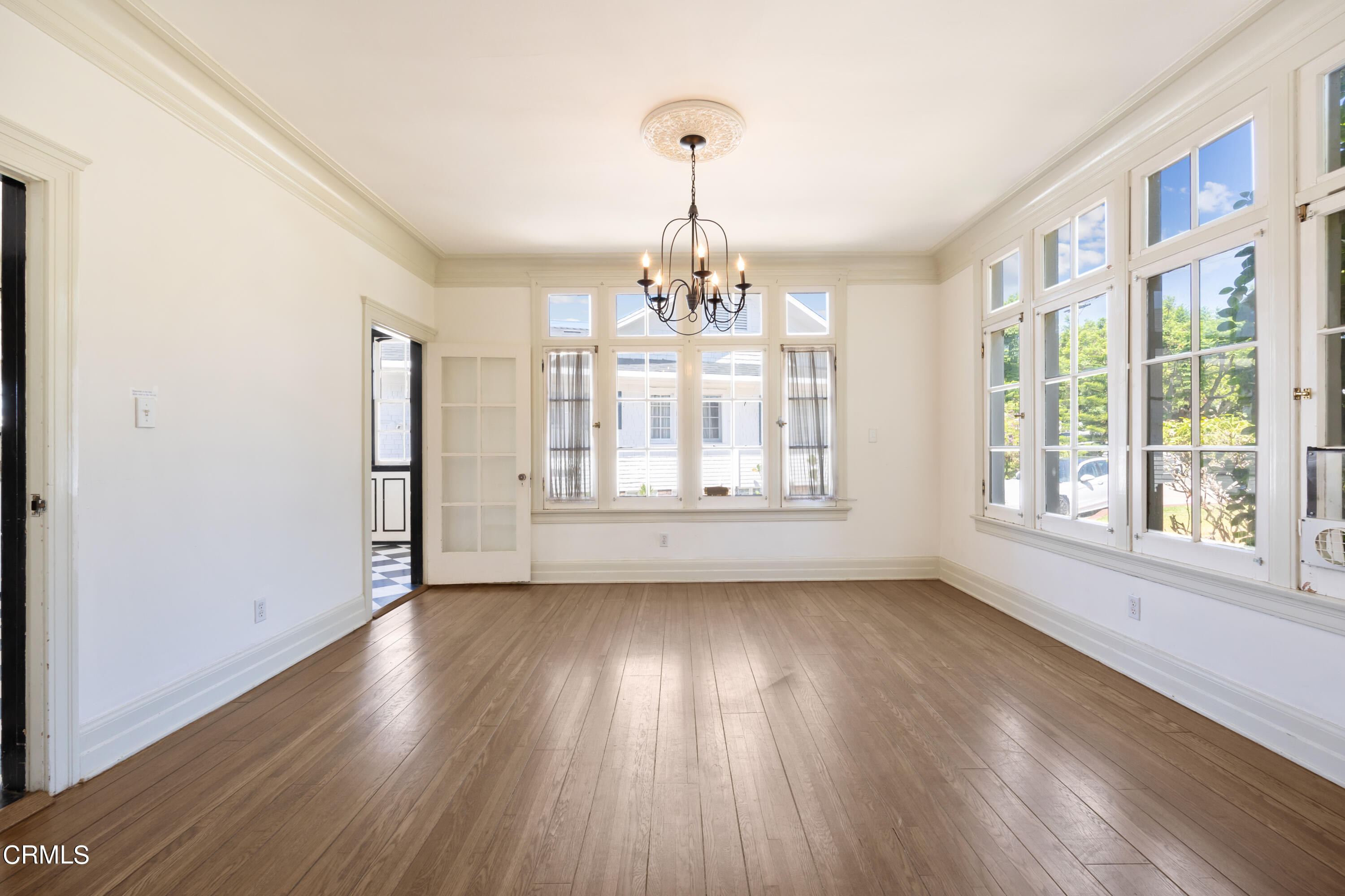430 West Kenneth Road Glendale, CA 91202 - Photo 15 of 73 a view of an empty room with wooden floor and a window