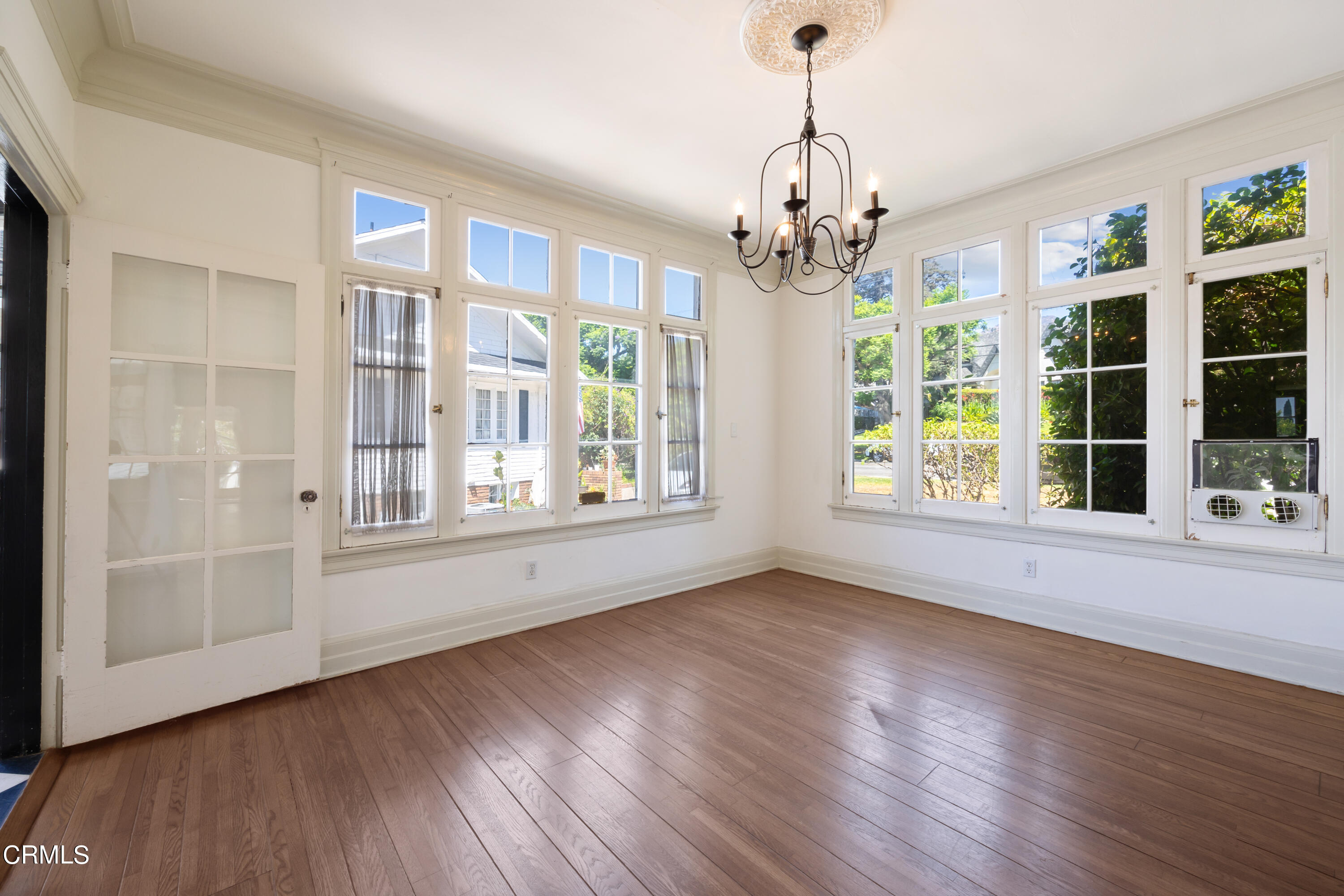 430 West Kenneth Road Glendale, CA 91202 - Photo 16 of 73 a view of an empty room with wooden floor and a window