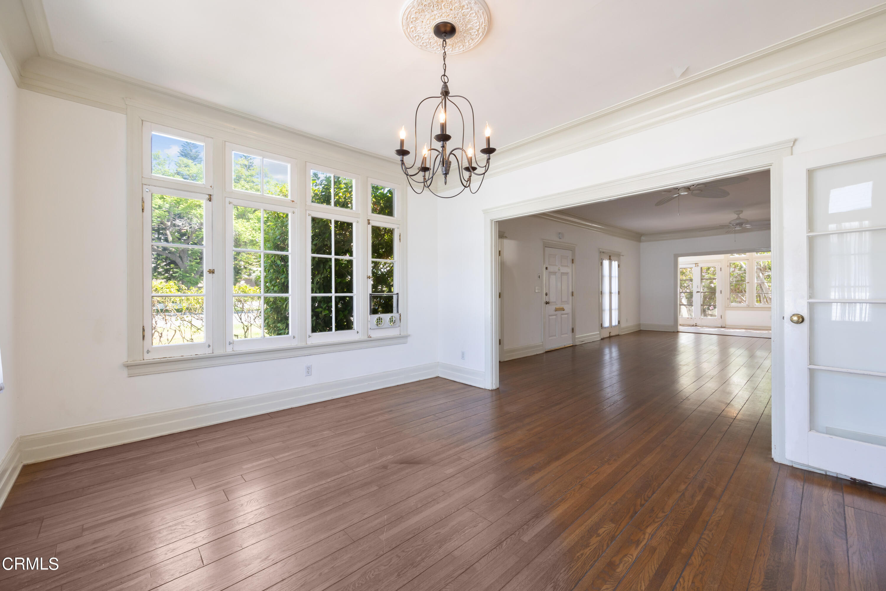 430 West Kenneth Road Glendale, CA 91202 - Photo 17 of 73 a view of an empty room with wooden floor and a window