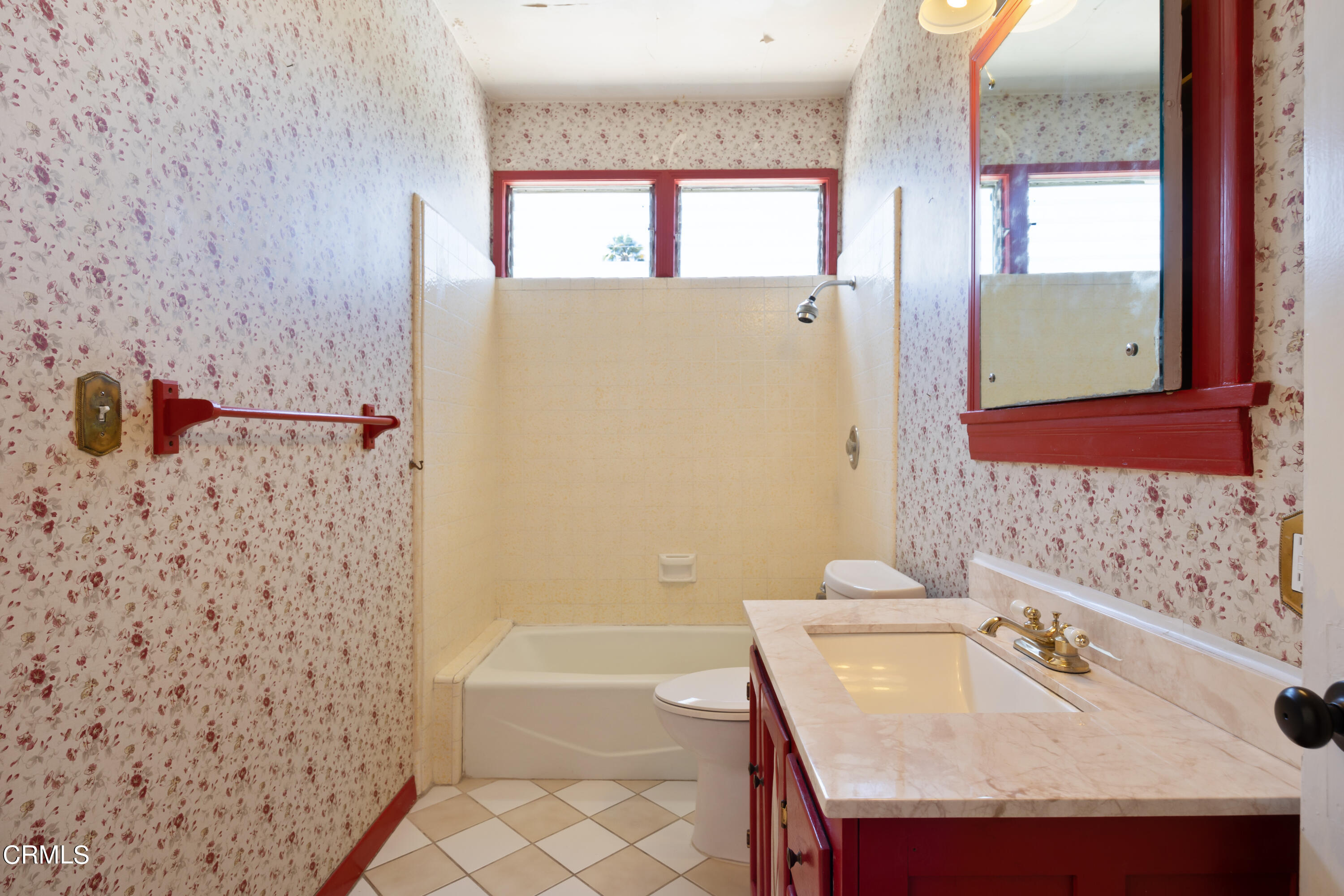 430 West Kenneth Road Glendale, CA 91202 - Photo 31 of 73 a bathroom with a sink and a mirror