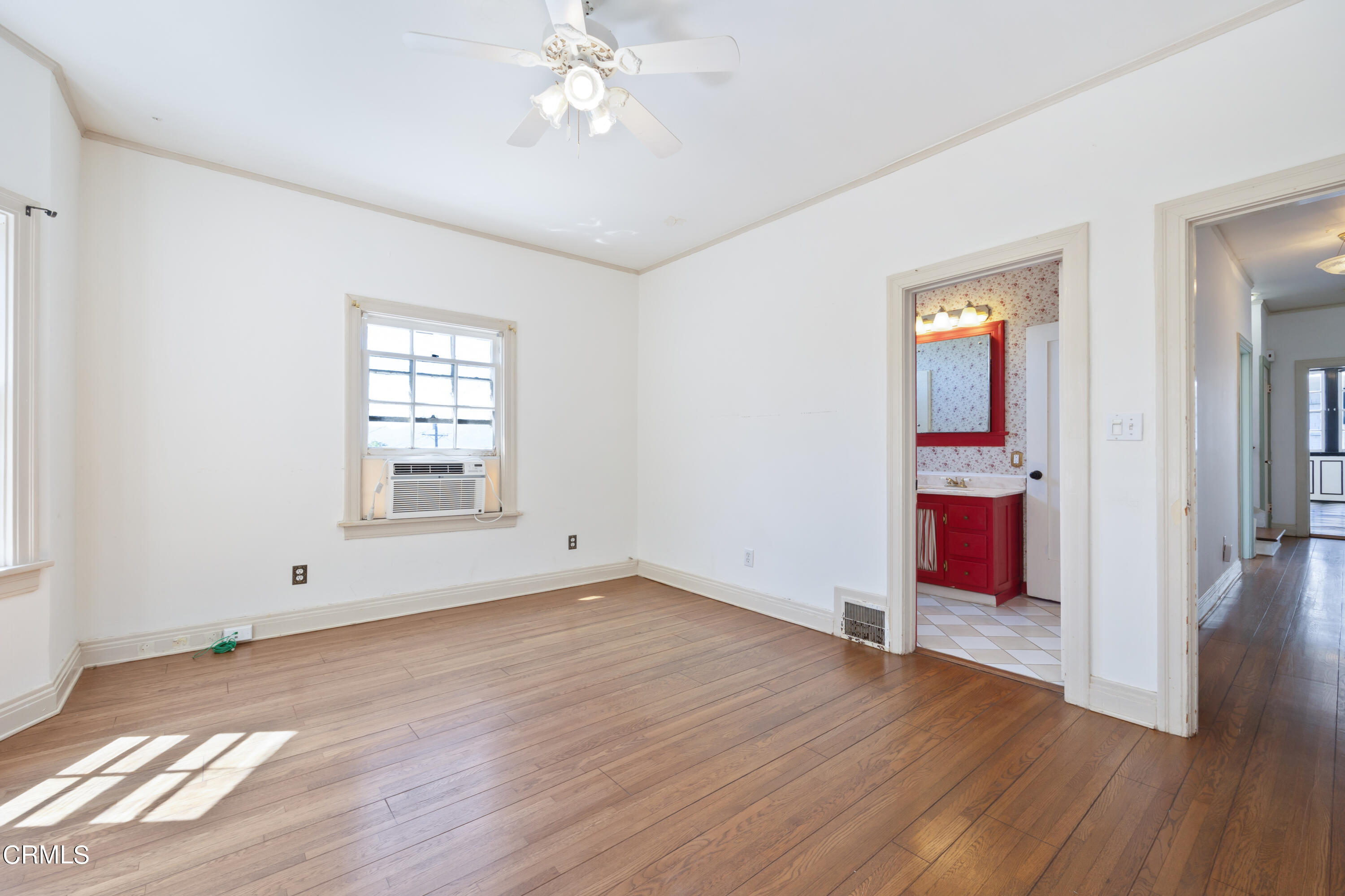 430 West Kenneth Road Glendale, CA 91202 - Photo 34 of 73 an empty room with wooden floor and windows