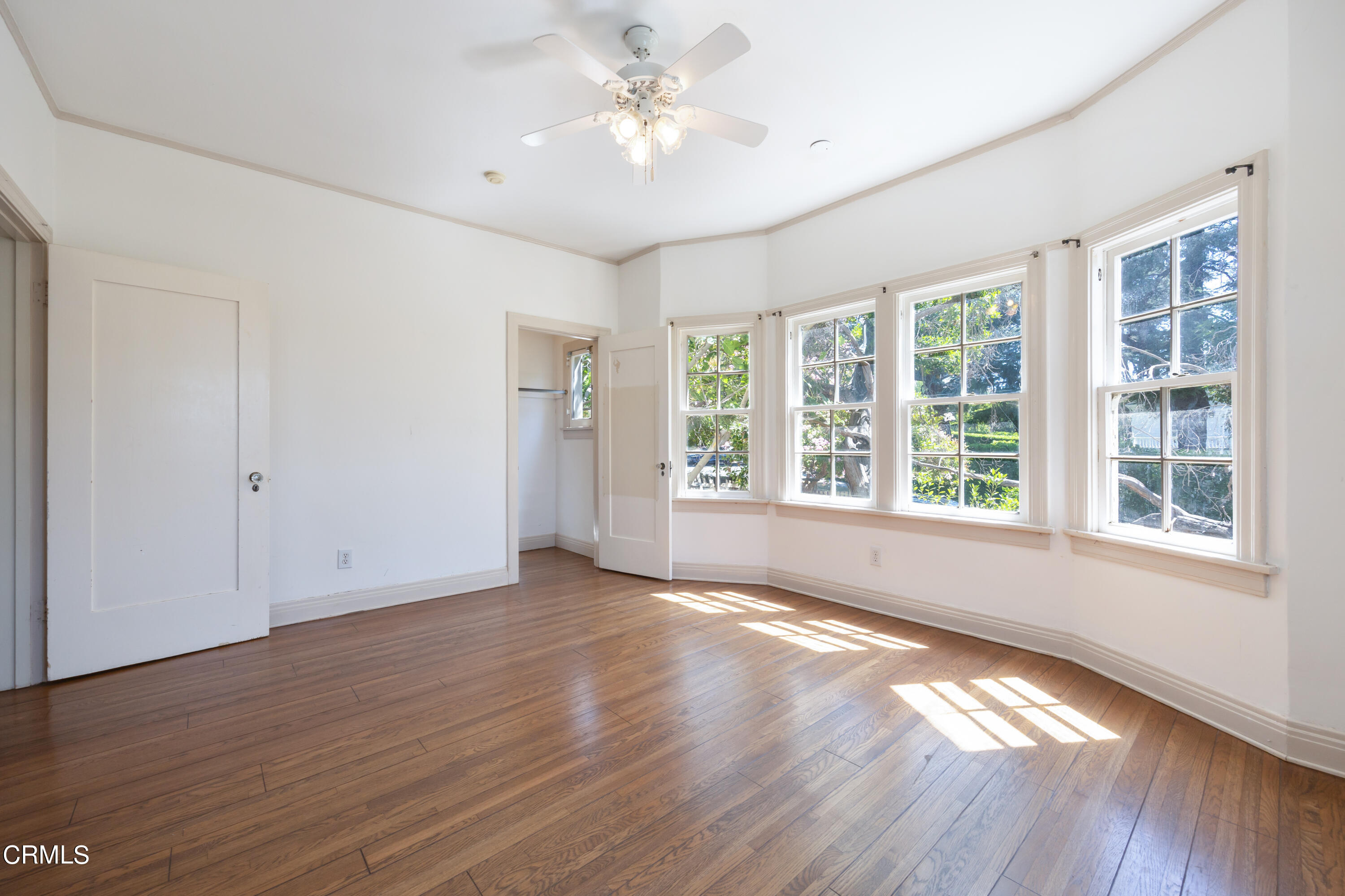 430 West Kenneth Road Glendale, CA 91202 - Photo 35 of 73 a view of an empty room with wooden floor and a window