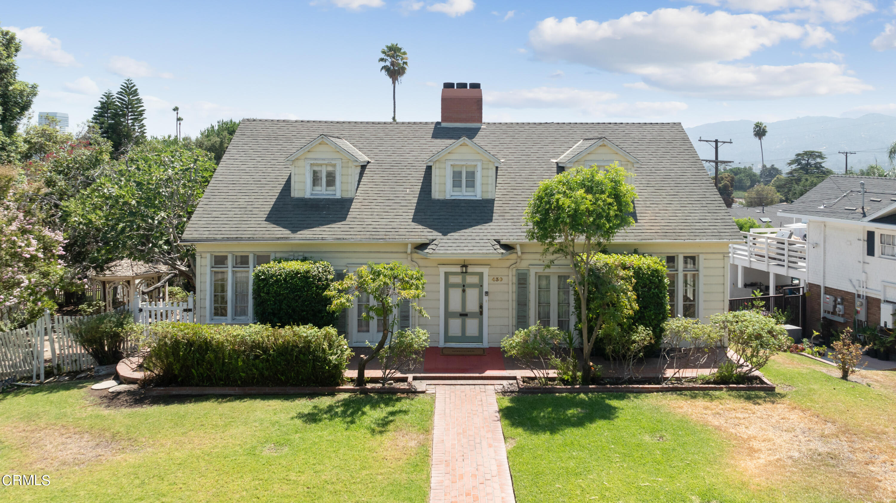 430 West Kenneth Road Glendale, CA 91202 - Photo 4 of 73 a front view of a house with garden