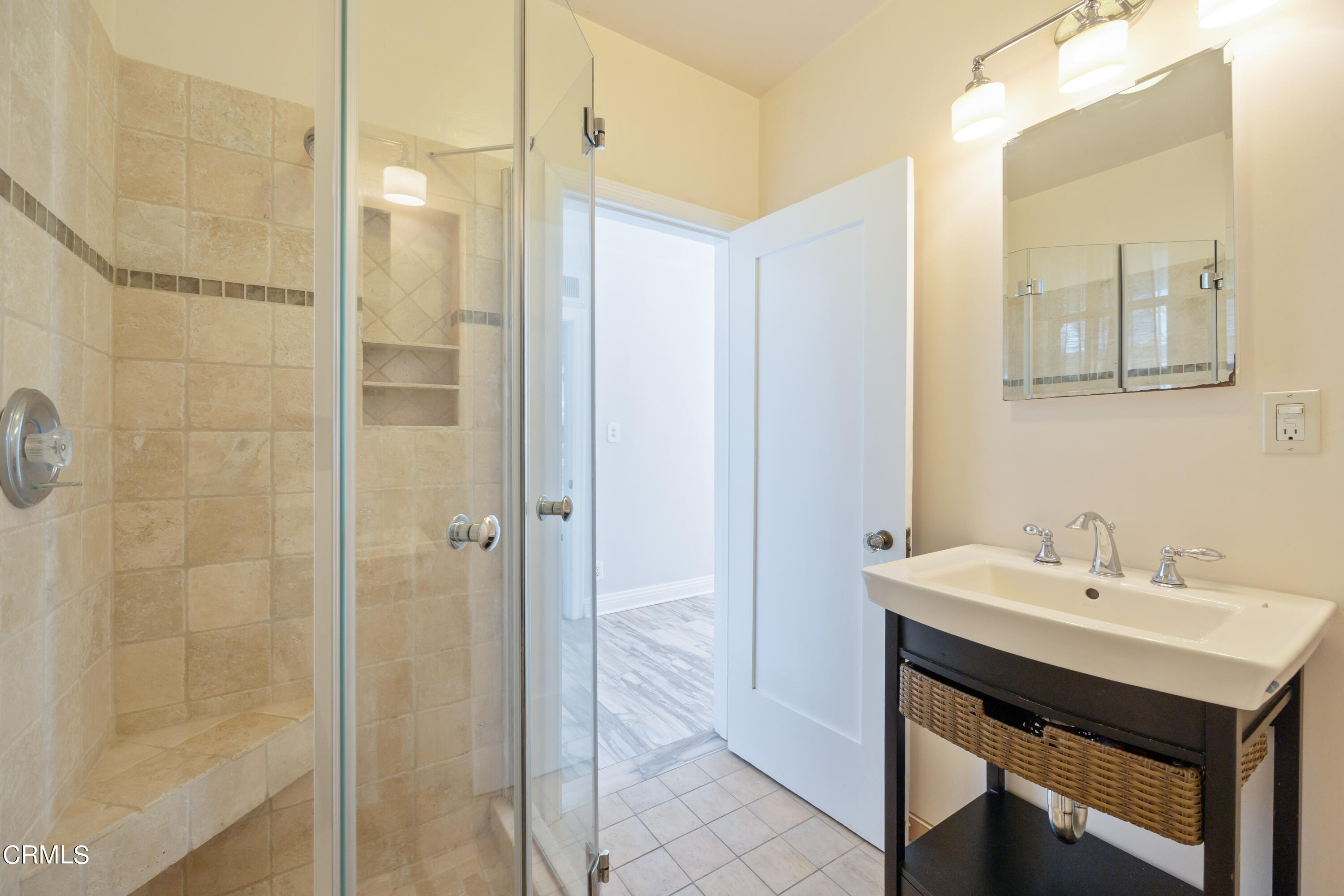 430 West Kenneth Road Glendale, CA 91202 - Photo 46 of 73 a bathroom with a sink and a mirror