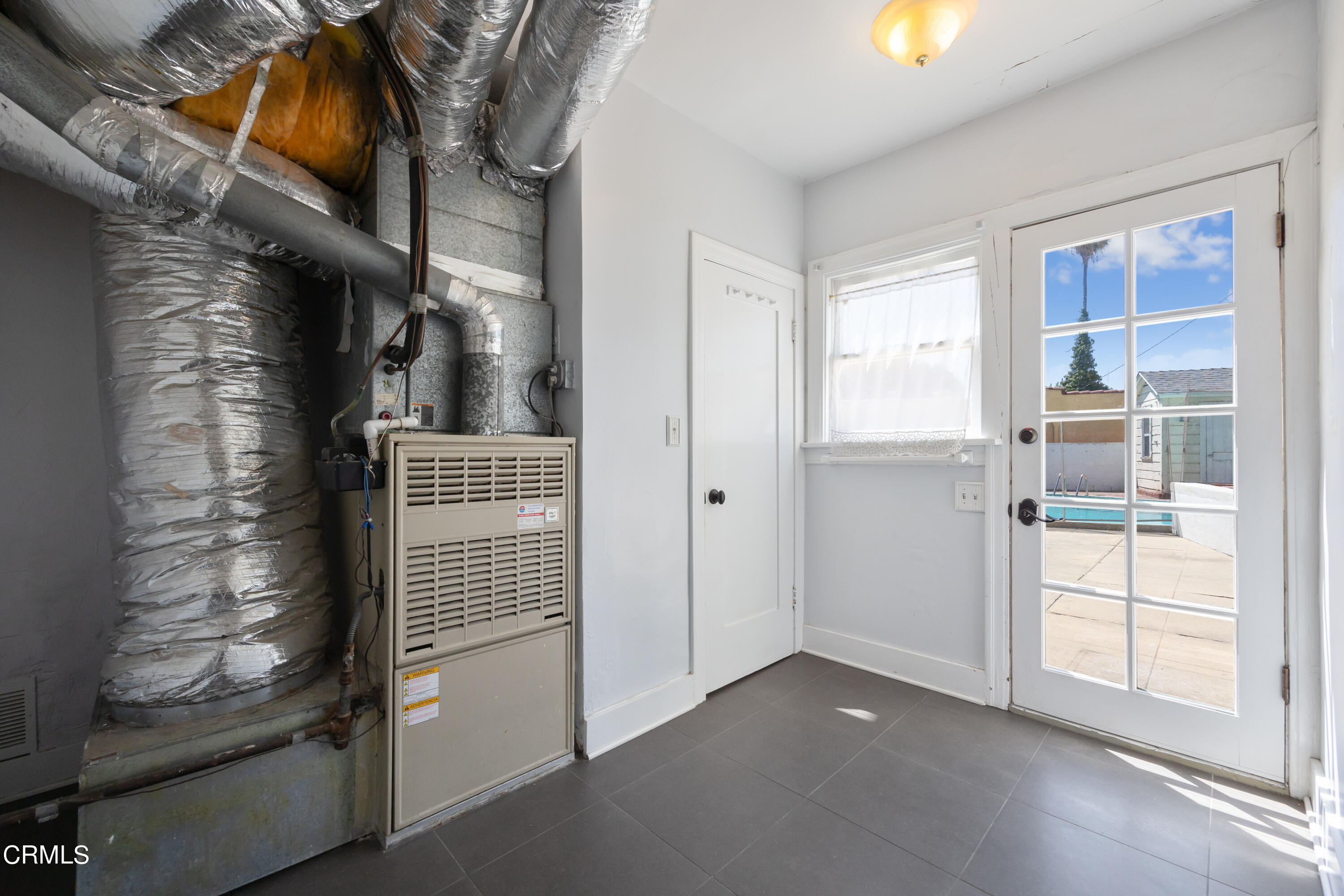 430 West Kenneth Road Glendale, CA 91202 - Photo 48 of 73 a view of empty room with windows and wardrobe