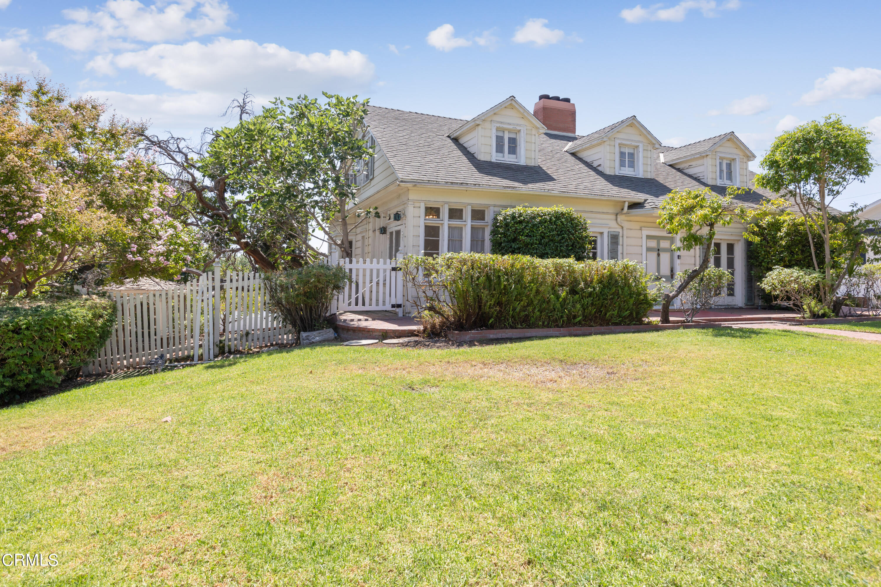 430 West Kenneth Road Glendale, CA 91202 - Photo 5 of 73 a front view of a house with a yard and swimming pool