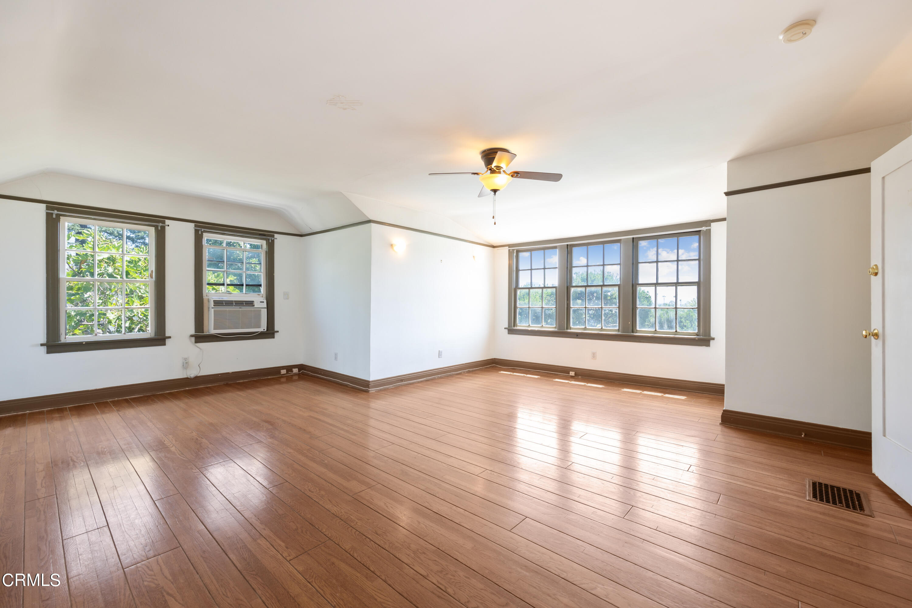 430 West Kenneth Road Glendale, CA 91202 - Photo 62 of 73 an empty room with wooden floor and windows