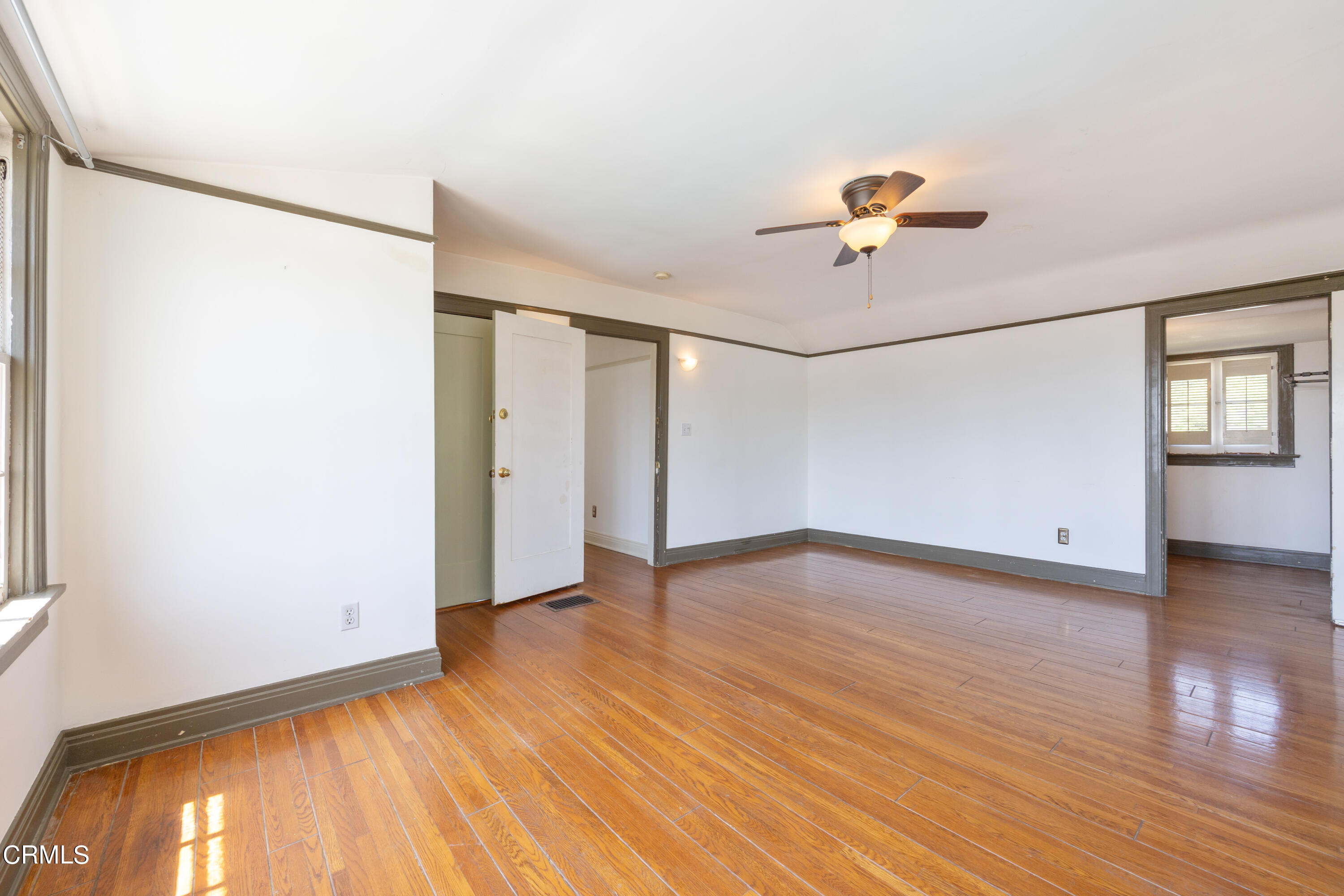 430 West Kenneth Road Glendale, CA 91202 - Photo 64 of 73 a view of empty room with wooden floor and fan