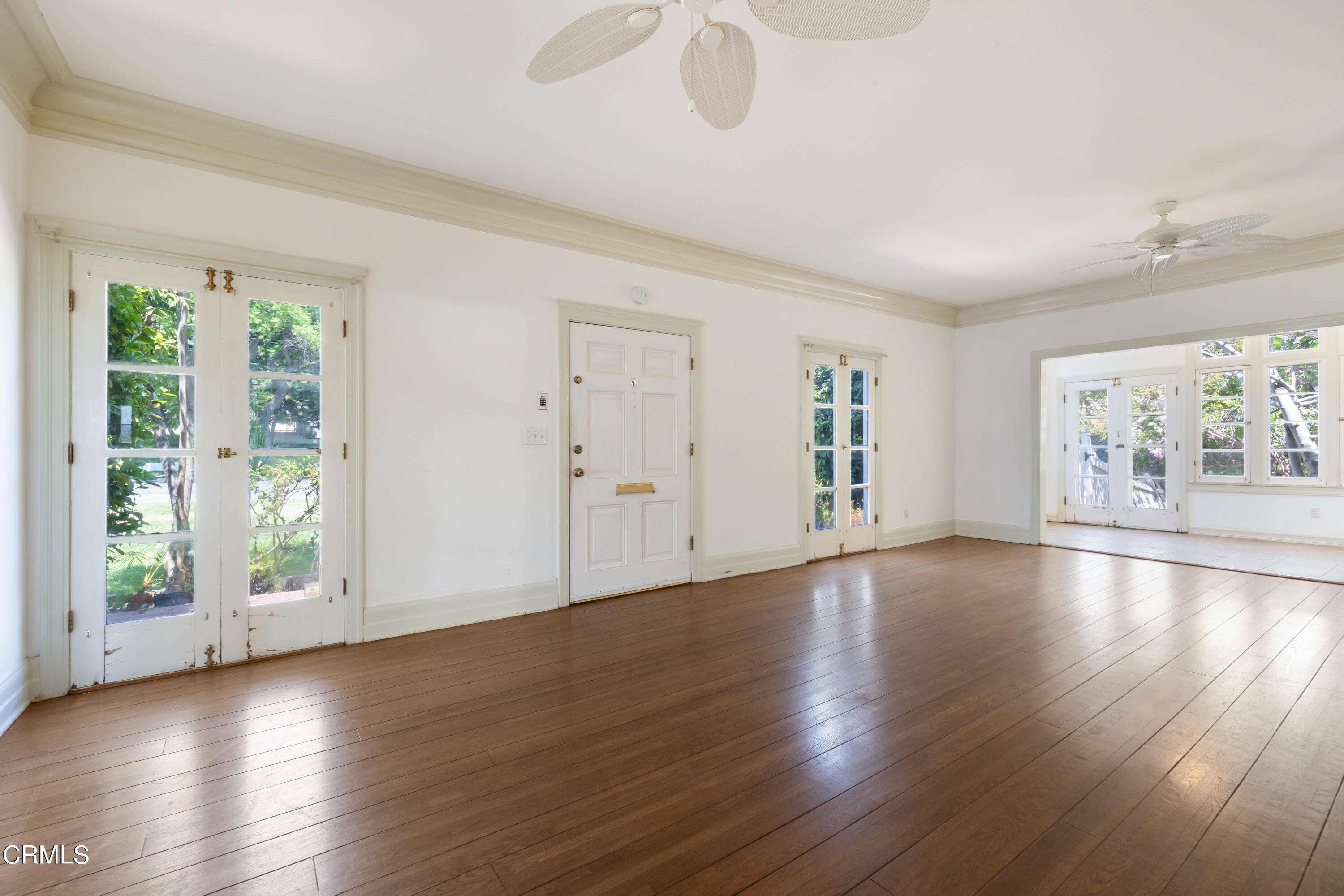 430 West Kenneth Road Glendale, CA 91202 - Photo 9 of 73 a view of an empty room with wooden floor and a window