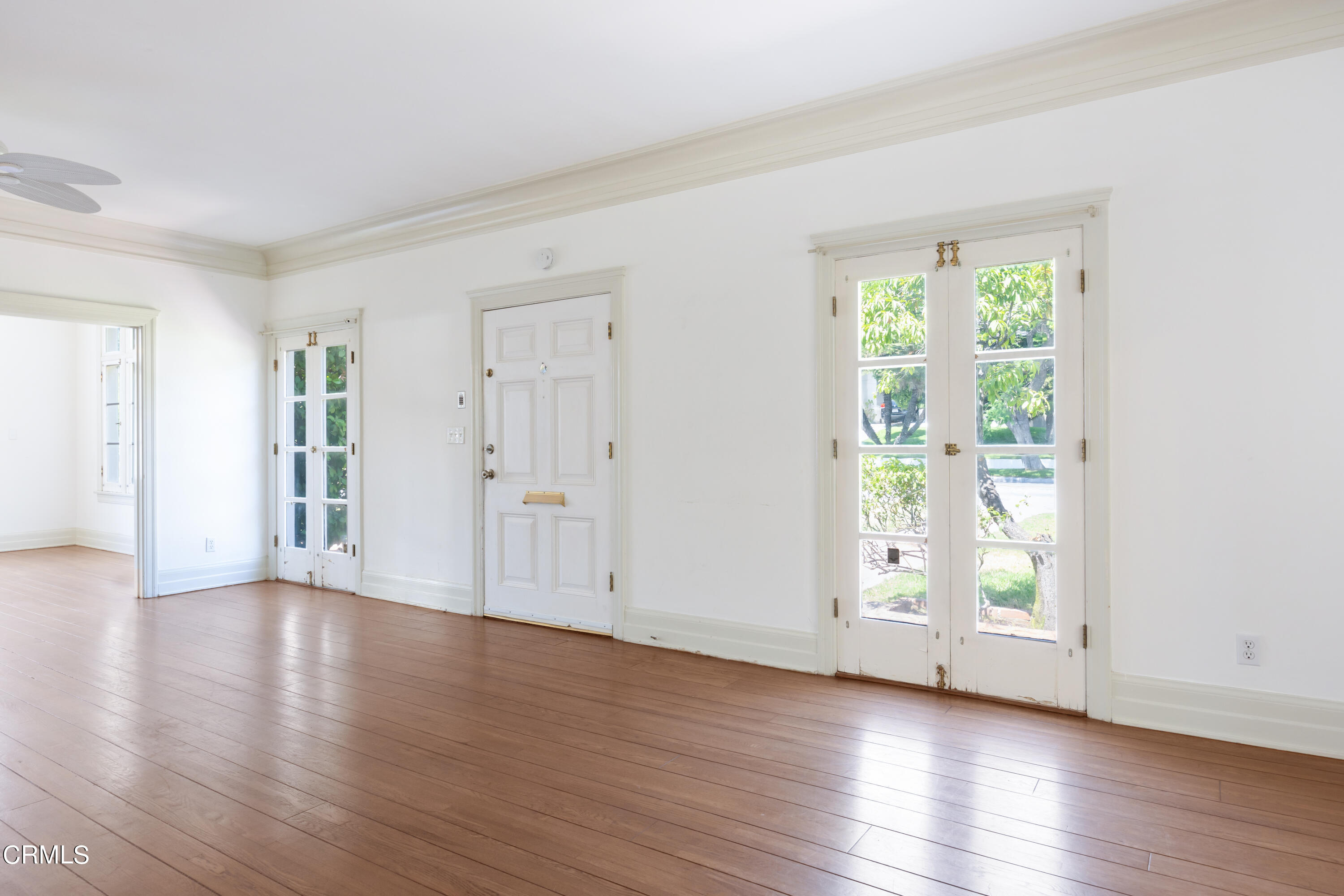 430 West Kenneth Road Glendale, CA 91202 - Photo 10 of 73 an empty room with wooden floor and windows