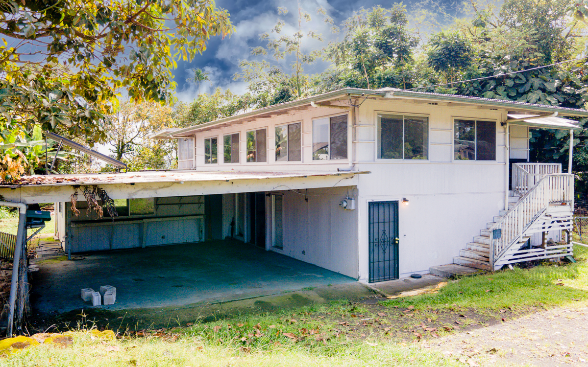 17-251 Volcano Road Keaau, HI 96749 - Photo 1 of 28 a view of a house with a yard