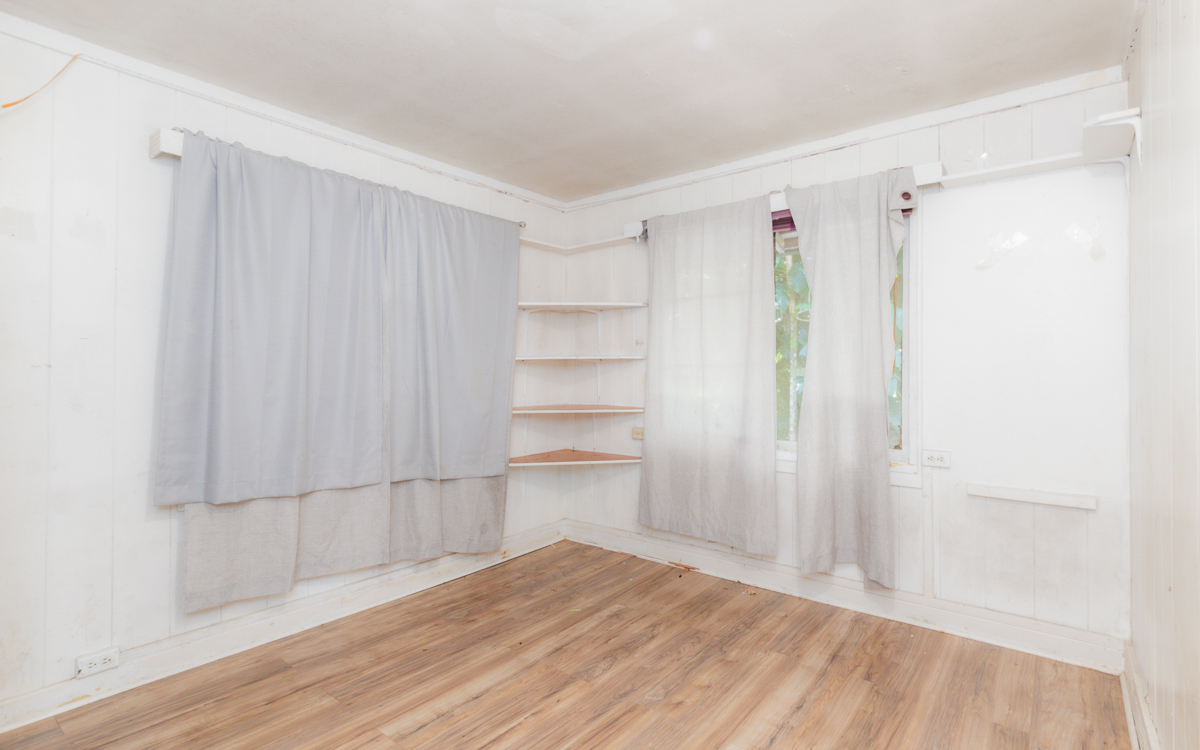 17-251 Volcano Road Keaau, HI 96749 - Photo 11 of 28 a view of walk in closet with empty racks