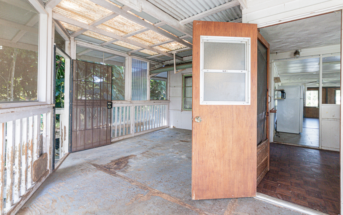17-251 Volcano Road Keaau, HI 96749 - Photo 12 of 28 a view of a porch with wooden floor and a porch