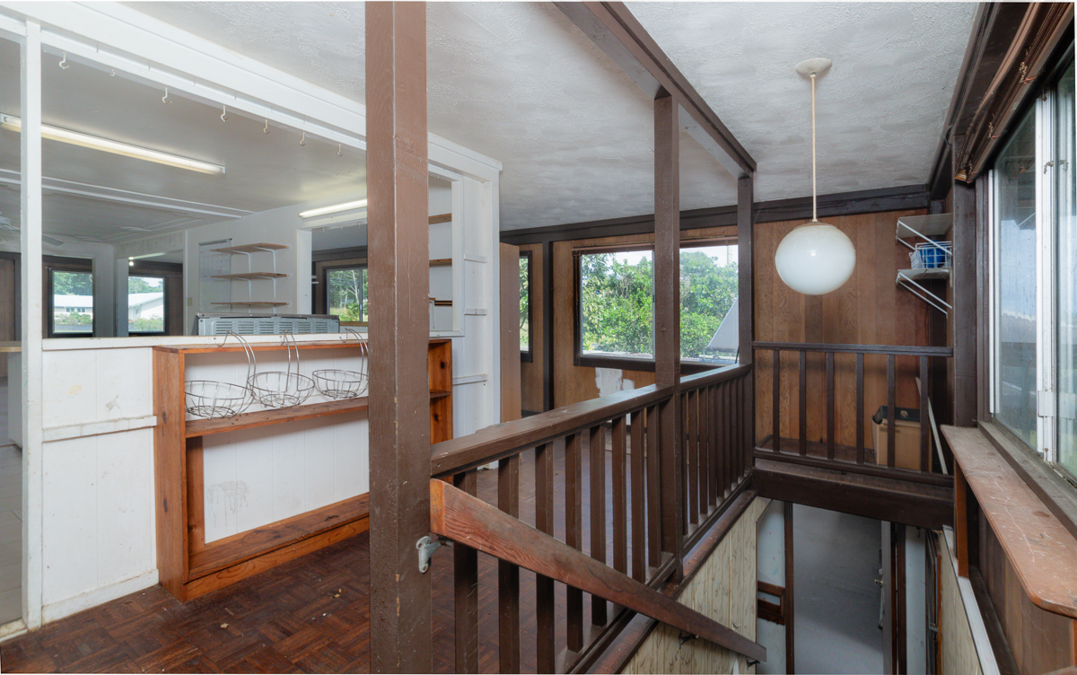 17-251 Volcano Road Keaau, HI 96749 - Photo 18 of 28 a view of a porch with wooden floor and windows