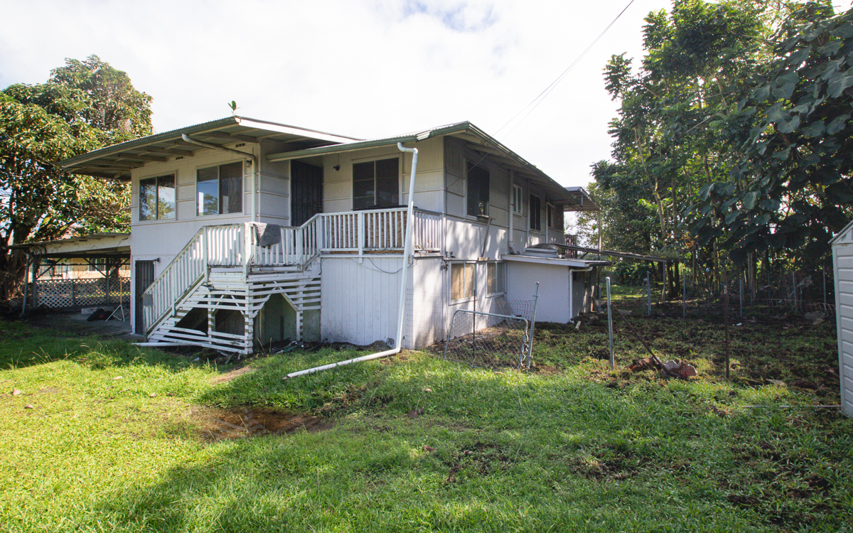 17-251 Volcano Road Keaau, HI 96749 - Photo 3 of 28 a view of a house with a yard and sitting area