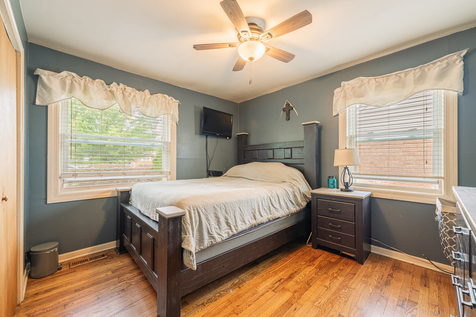 11015 Massasoit Avenue Chicago Ridge, IL 60415 - Photo 8 of 24 a bed sitting in a bedroom next to a window