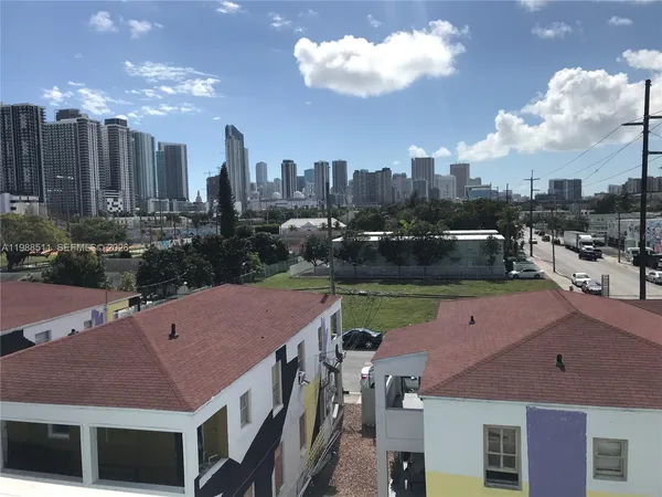 a view of a city with tall buildings