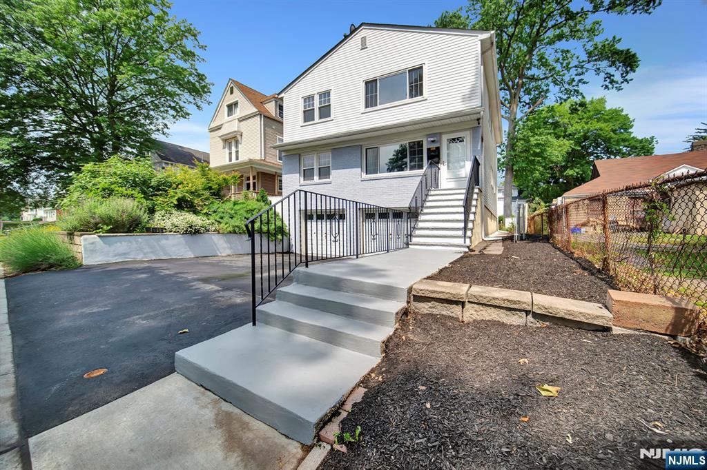 509 Grove Street Bloomfield, NJ 07017 - Photo 2 of 29 a view of a house with backyard and sitting area