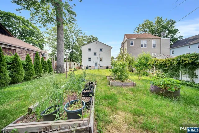 a view of a house with a street
