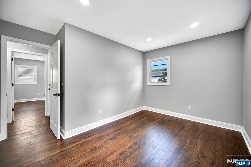 509 Grove Street Bloomfield, NJ 07017 - Photo 5 of 29 a view of empty room with wooden floor