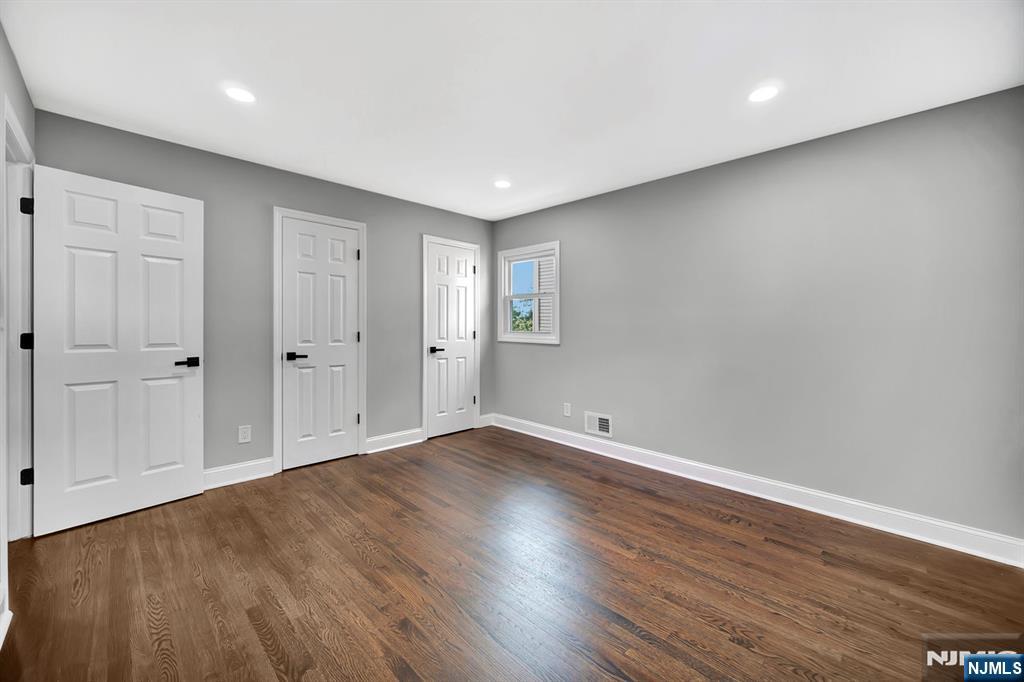 509 Grove Street Bloomfield, NJ 07017 - Photo 6 of 29 a view of an empty room with wooden floor