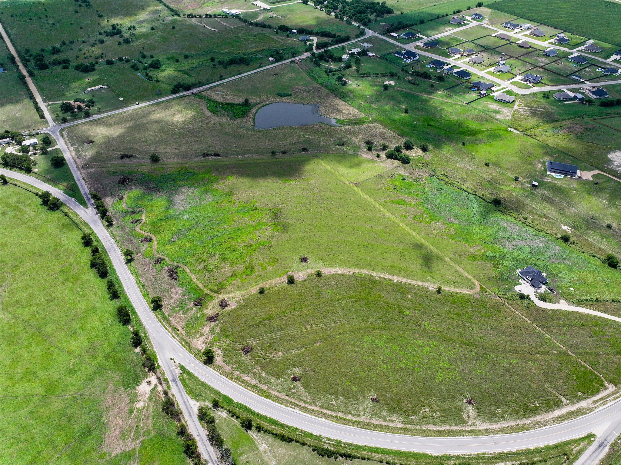 19621 Fm 2115 Salado, TX 76571 - Photo 20 of 29 a view of a swimming pool with a yard