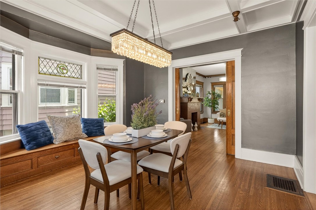 34 Erion Crescent Rochester, NY 14607 - Photo 16 of 49 dining room with window seat and view to living ro