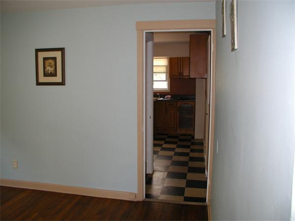 120 Merida Street Springfield, MA 01104 - Photo 6 of 24 a view of a hallway with wooden cabinets