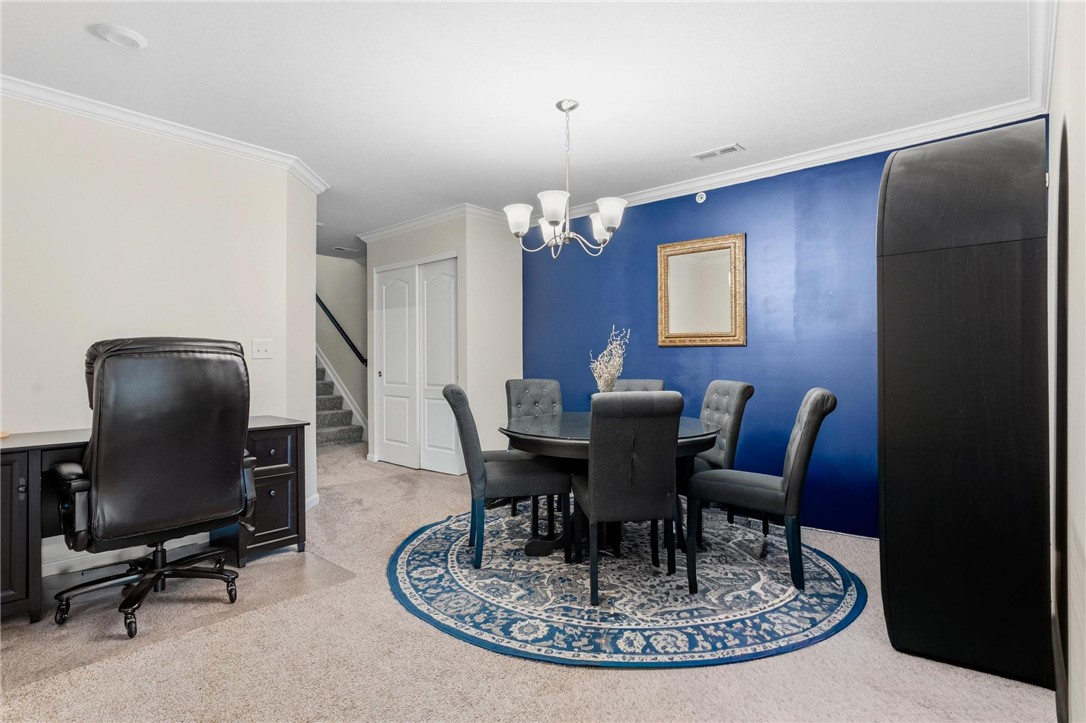 141 Old Pond Road Springboro, OH 45066 - Photo 11 of 20 This versatile space seamlessly combines dining and office areas for modern living.