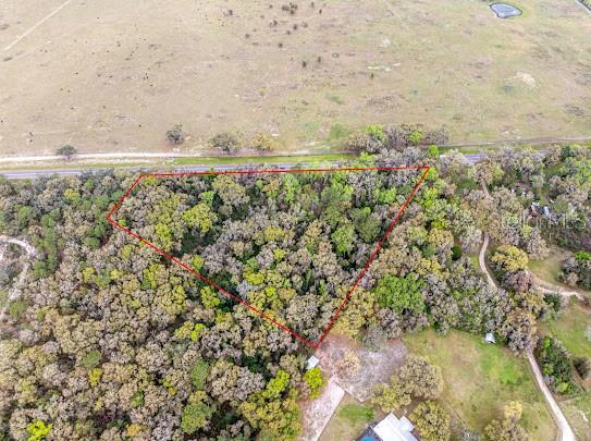 24 Archer Archer, FL 32618 - Photo 4 of 8 a view of a lake with a mountain