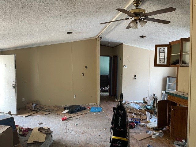 96761 Blackrock Road Yulee, FL 32097 - Photo 6 of 7 a bedroom with a bed and a flat tv screen on the dresser
