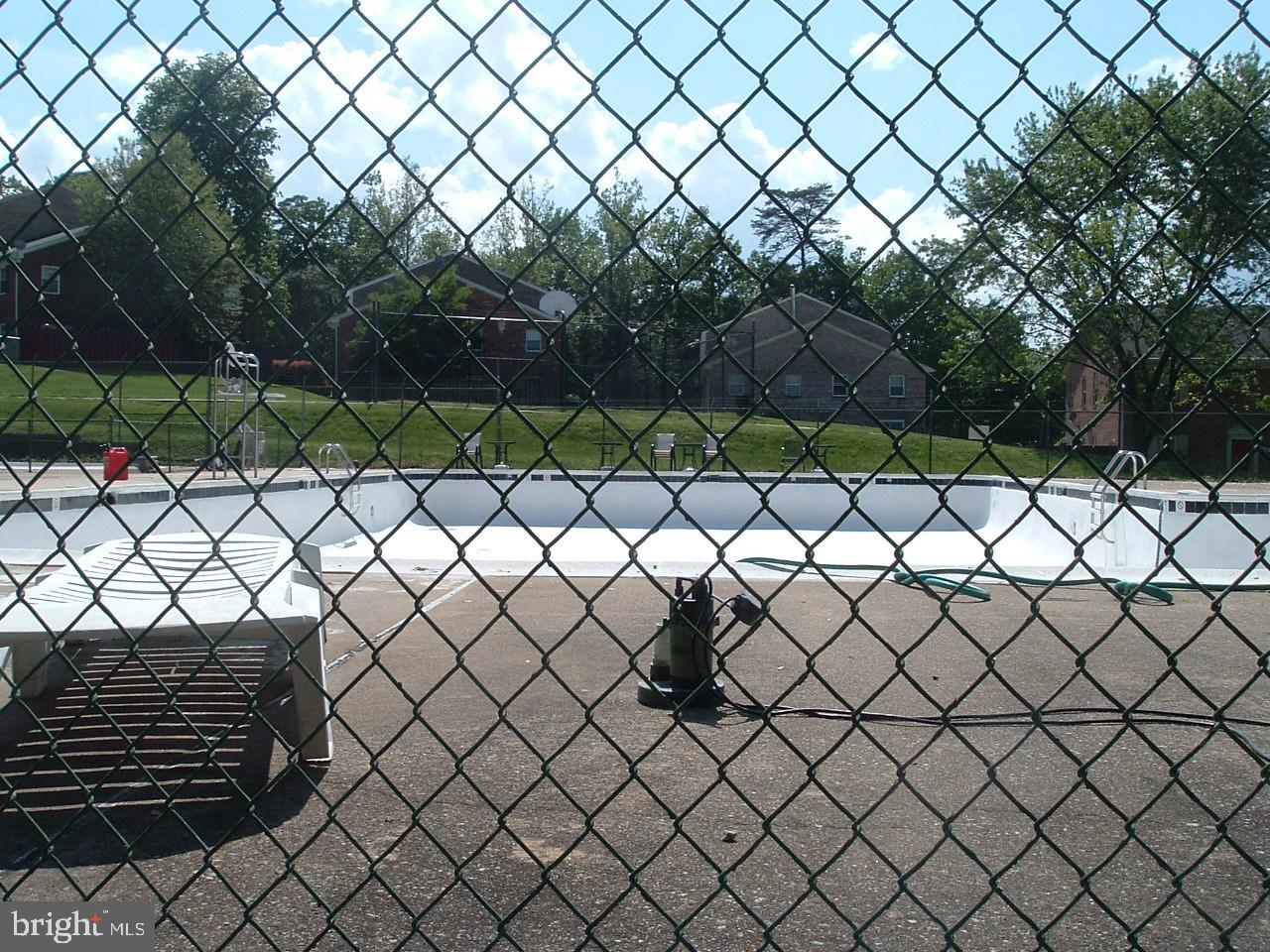 9746 Hagel Circle, Unit E Lorton, VA 22079 - Photo 16 of 18 Complex Amenities - Fenced in Pool