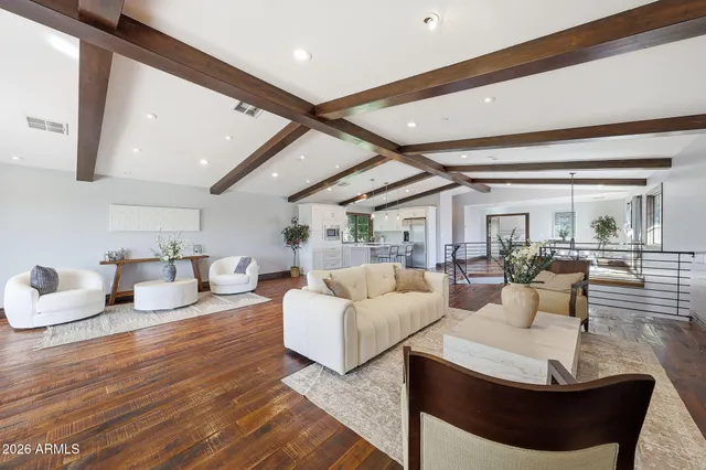 a kitchen with kitchen island a counter top space and a sink