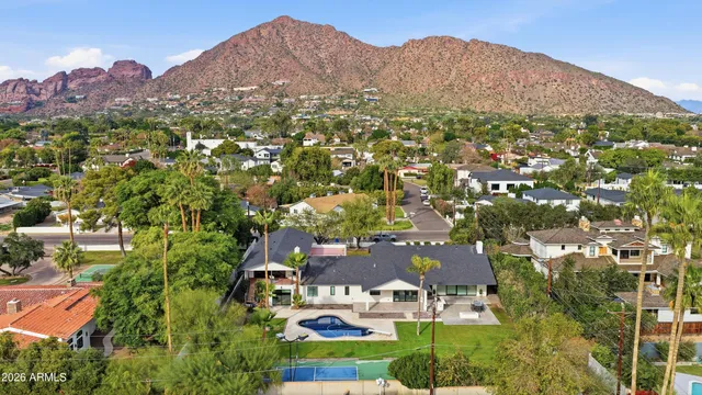 a view of a city with a mountain in the background