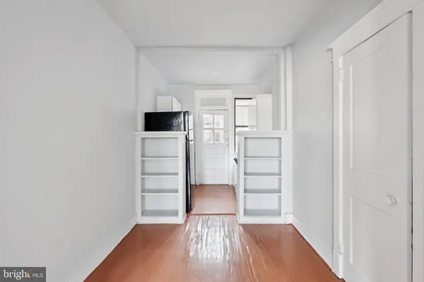 a kitchen with a stove and a microwave