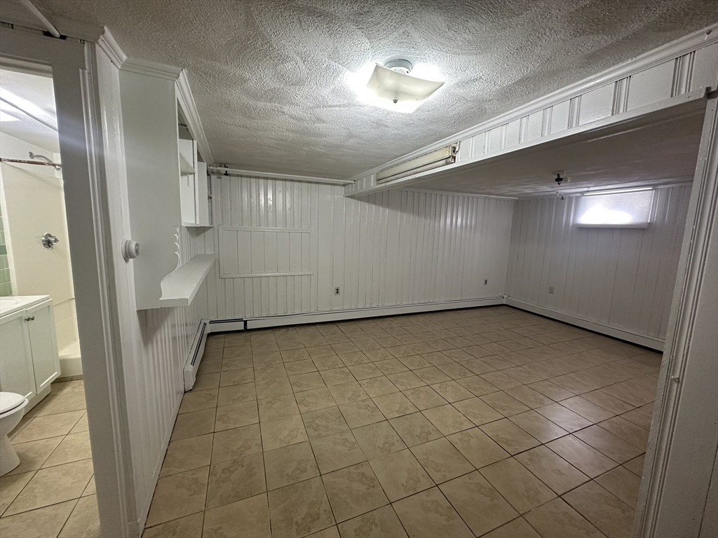 206 Adams Street, Unit 206 Newton, MA 02458 - Photo 27 of 37 a view of a garage