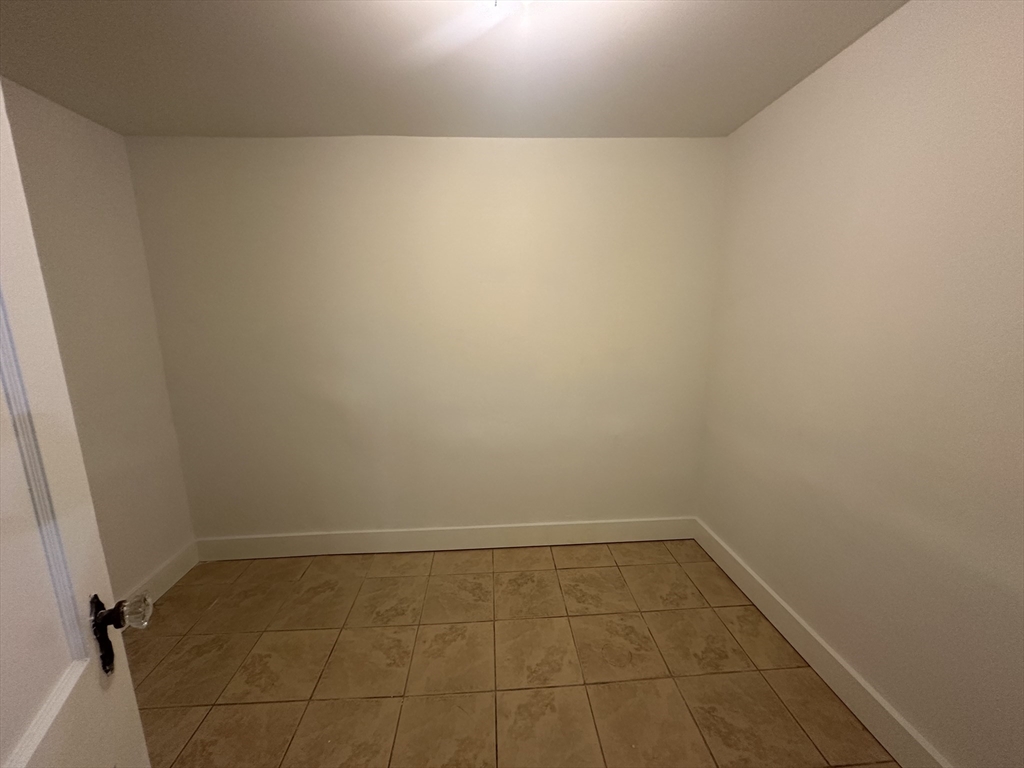 206 Adams Street, Unit 206 Newton, MA 02458 - Photo 35 of 37 a view of a room with an empty space