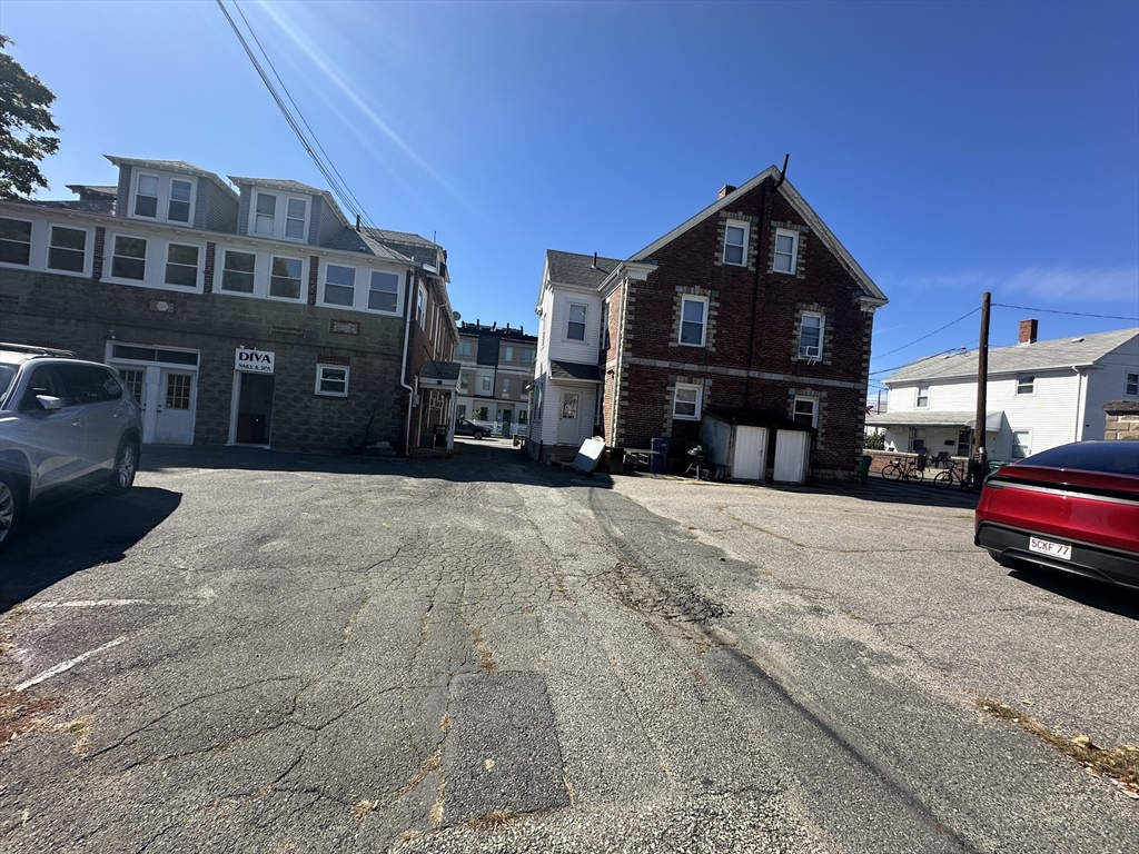 206 Adams Street, Unit 206 Newton, MA 02458 - Photo 37 of 37 a view of a street with cars