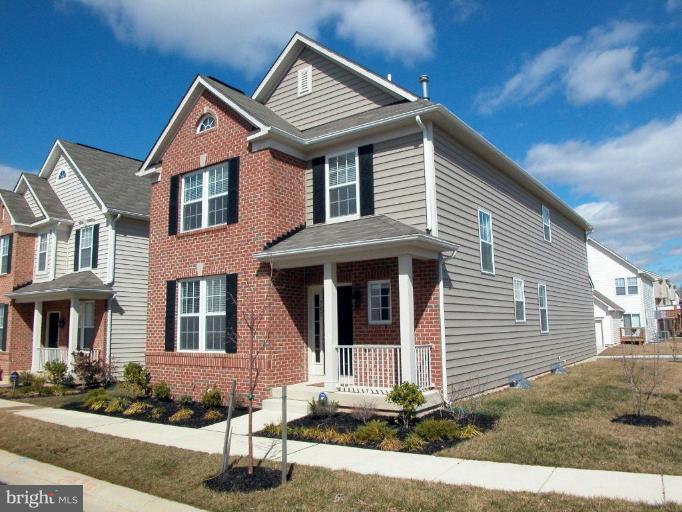 705 Luke Road Middle River, MD 21220 - Photo 1 of 1 a front view of a house with yard