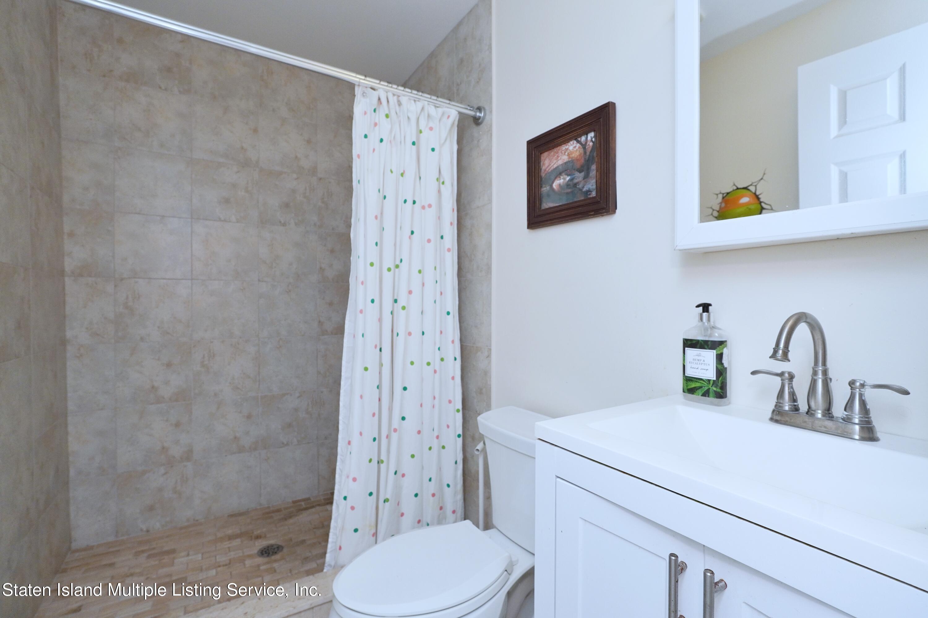 75 4 Corners Road Staten Island, NY 10304 - Photo 38 of 49 bathroom_basement