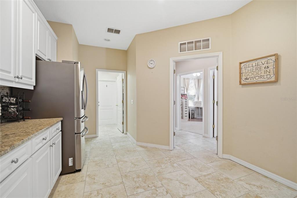 6057 Sandhill Ridge Drive Lithia, FL 33547 - Photo 32 of 83 a view of a kitchen cabinets and wooden floor
