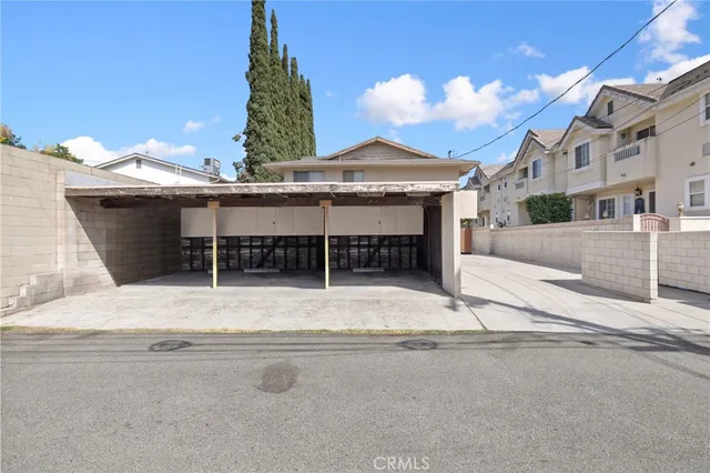 a view of swimming pool with a yard and plants