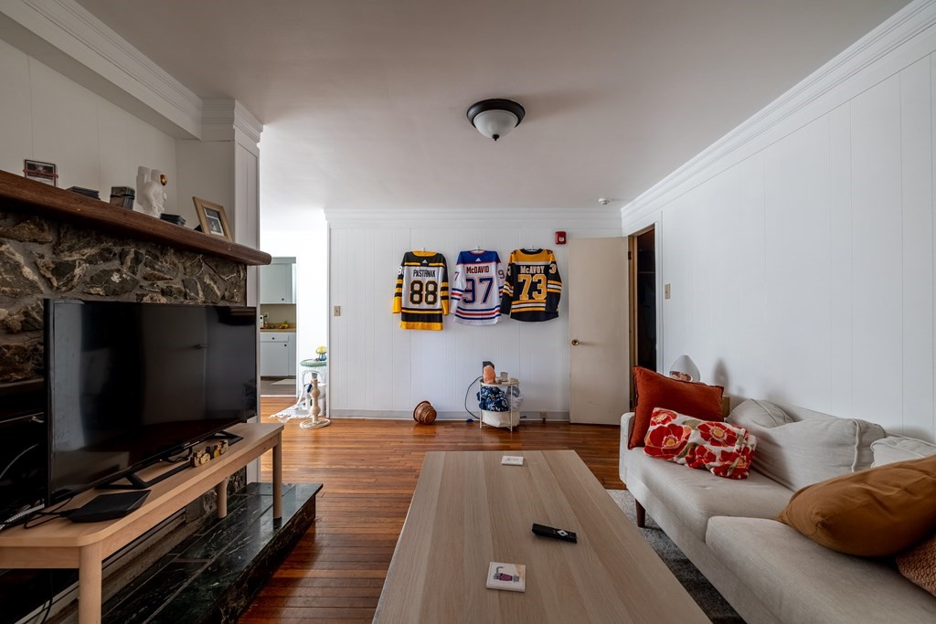 102 Mendon Street Blackstone, MA 01504 - Photo 13 of 41 a living room with furniture and a flat screen tv