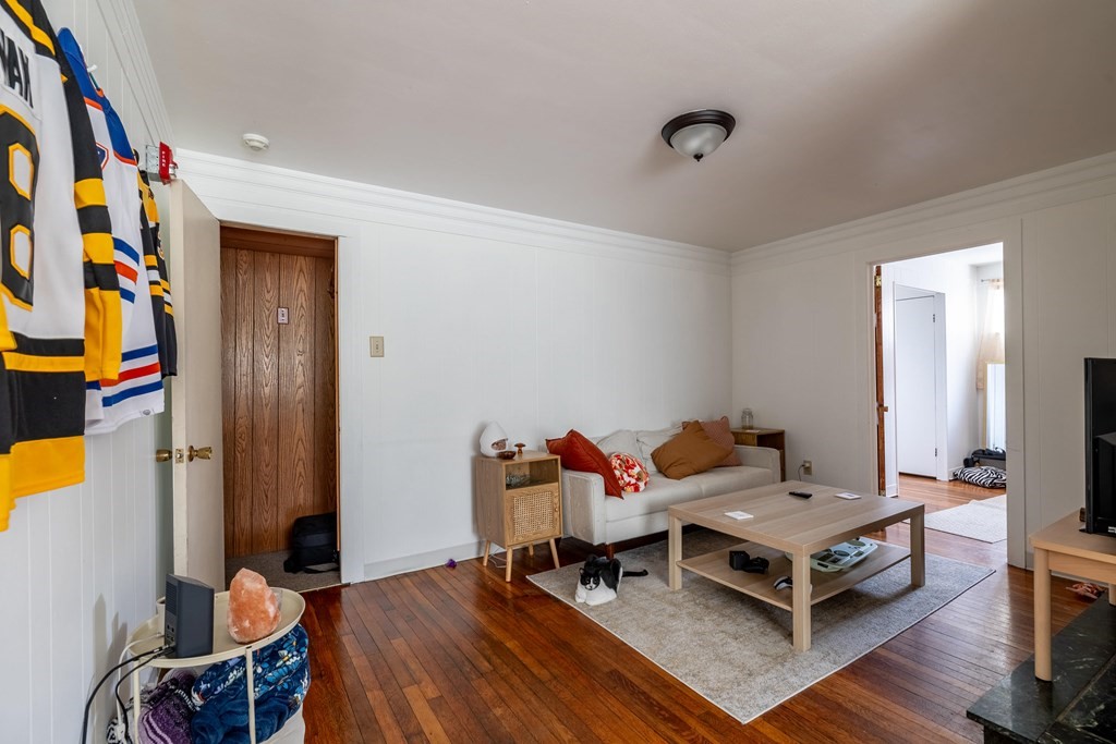 102 Mendon Street Blackstone, MA 01504 - Photo 16 of 41 a living room with furniture and wooden floor